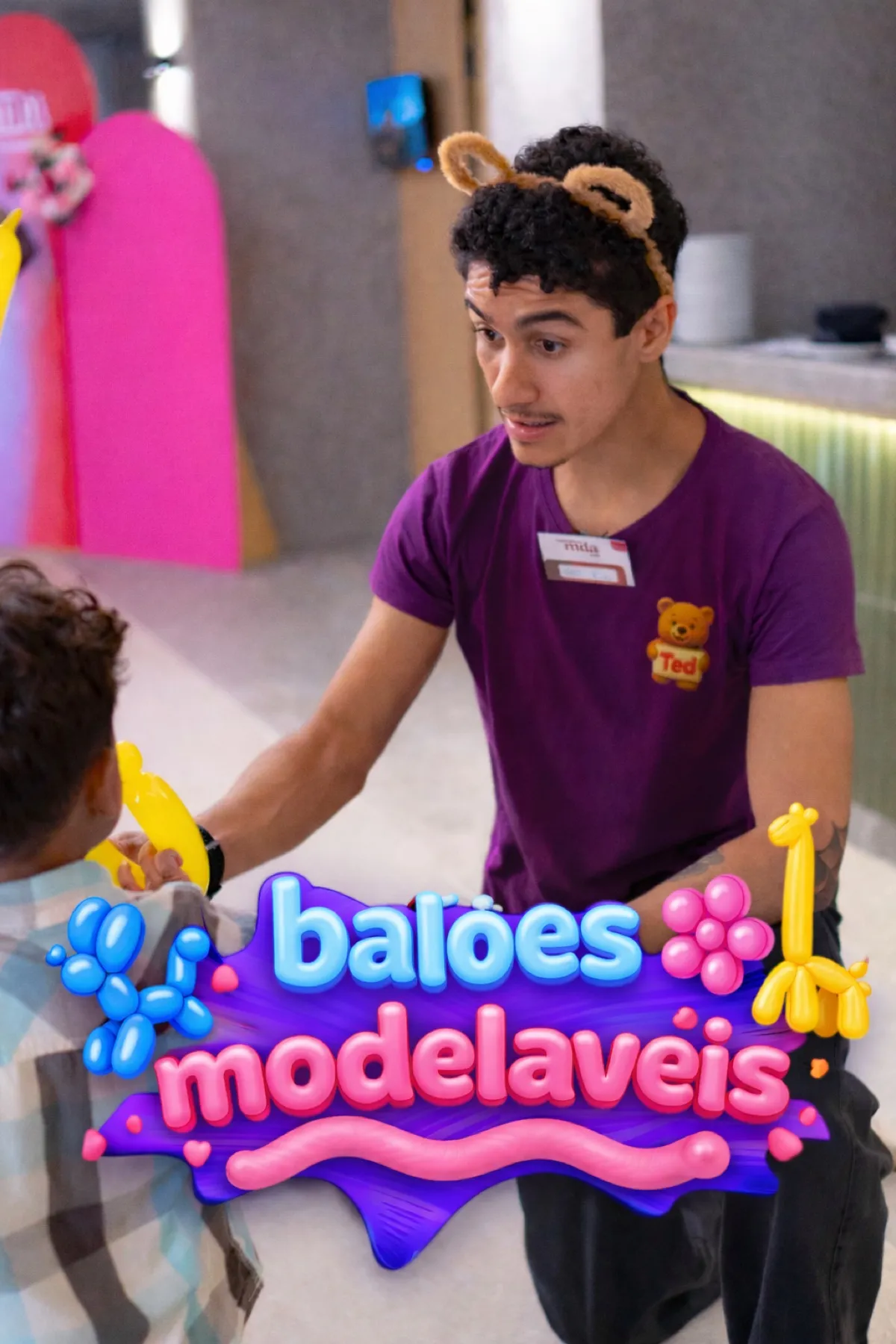 Ted making balloon models with a child