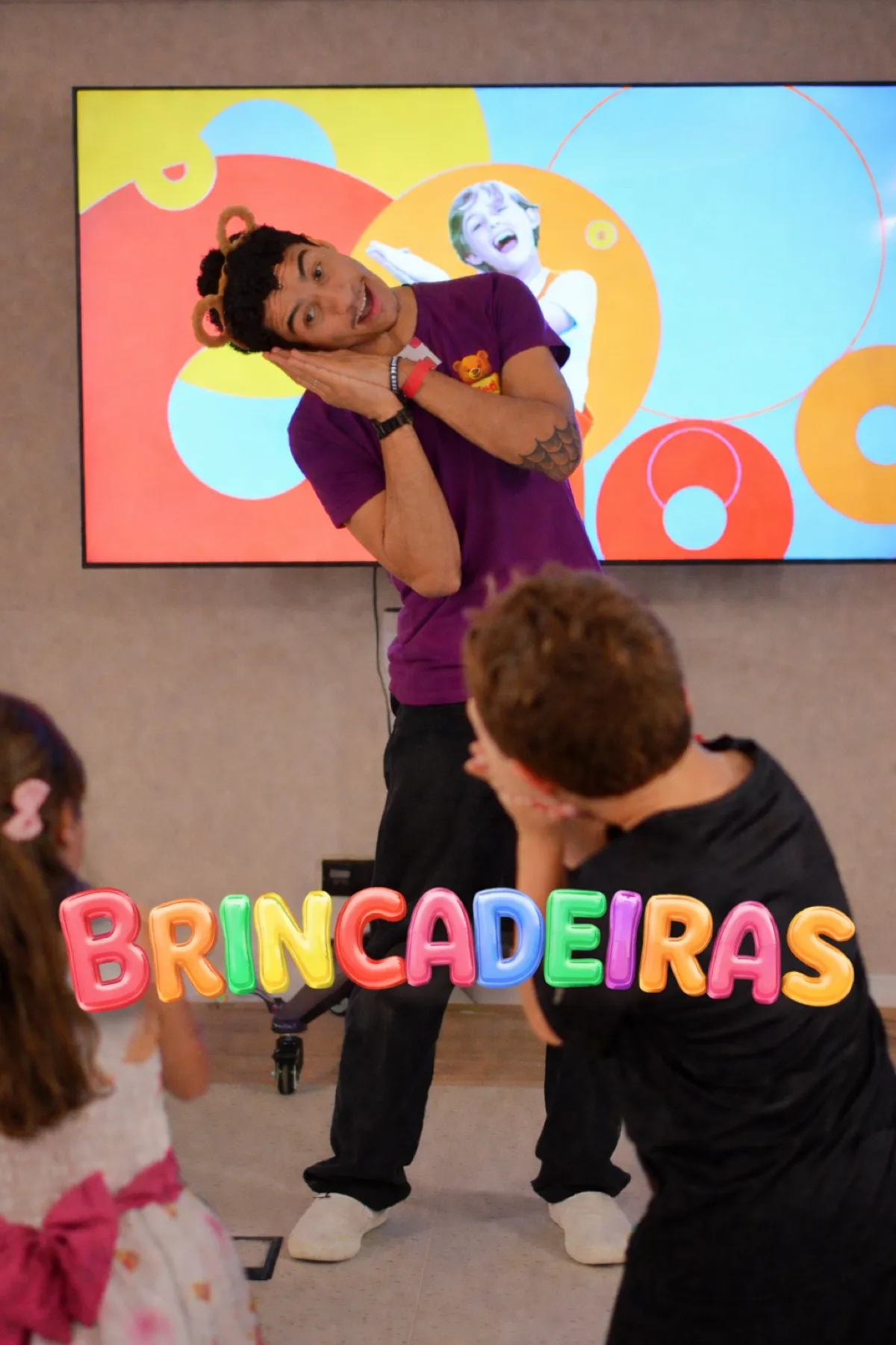 Ted leading games with a group of children